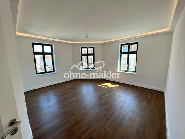 Wohnzimmer über Eck