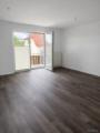 KI-Visualisierung – WZ mit Balkon