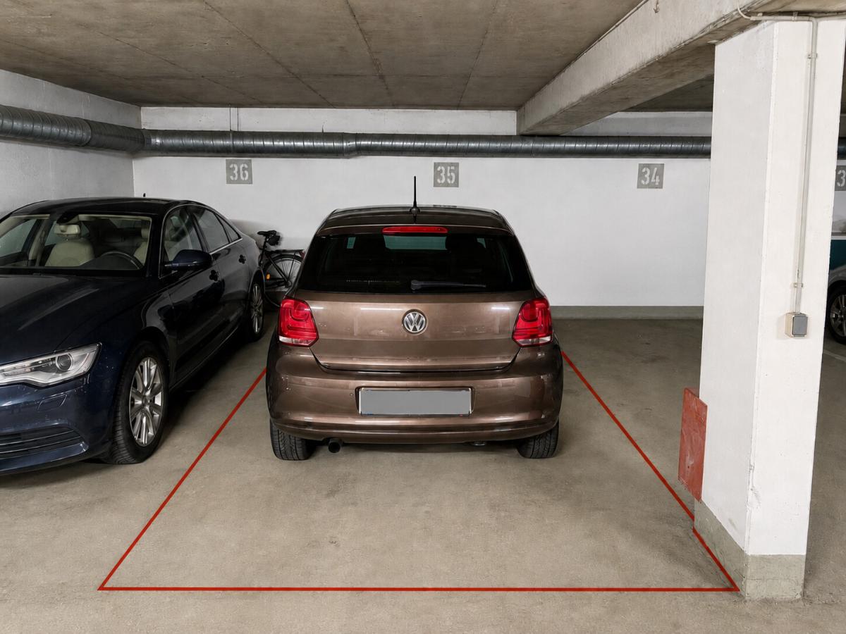 Zugehöriger Tiefgaragenstellplatz
