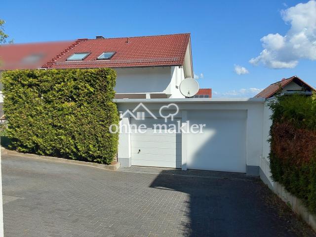 Garage und Stellplatz