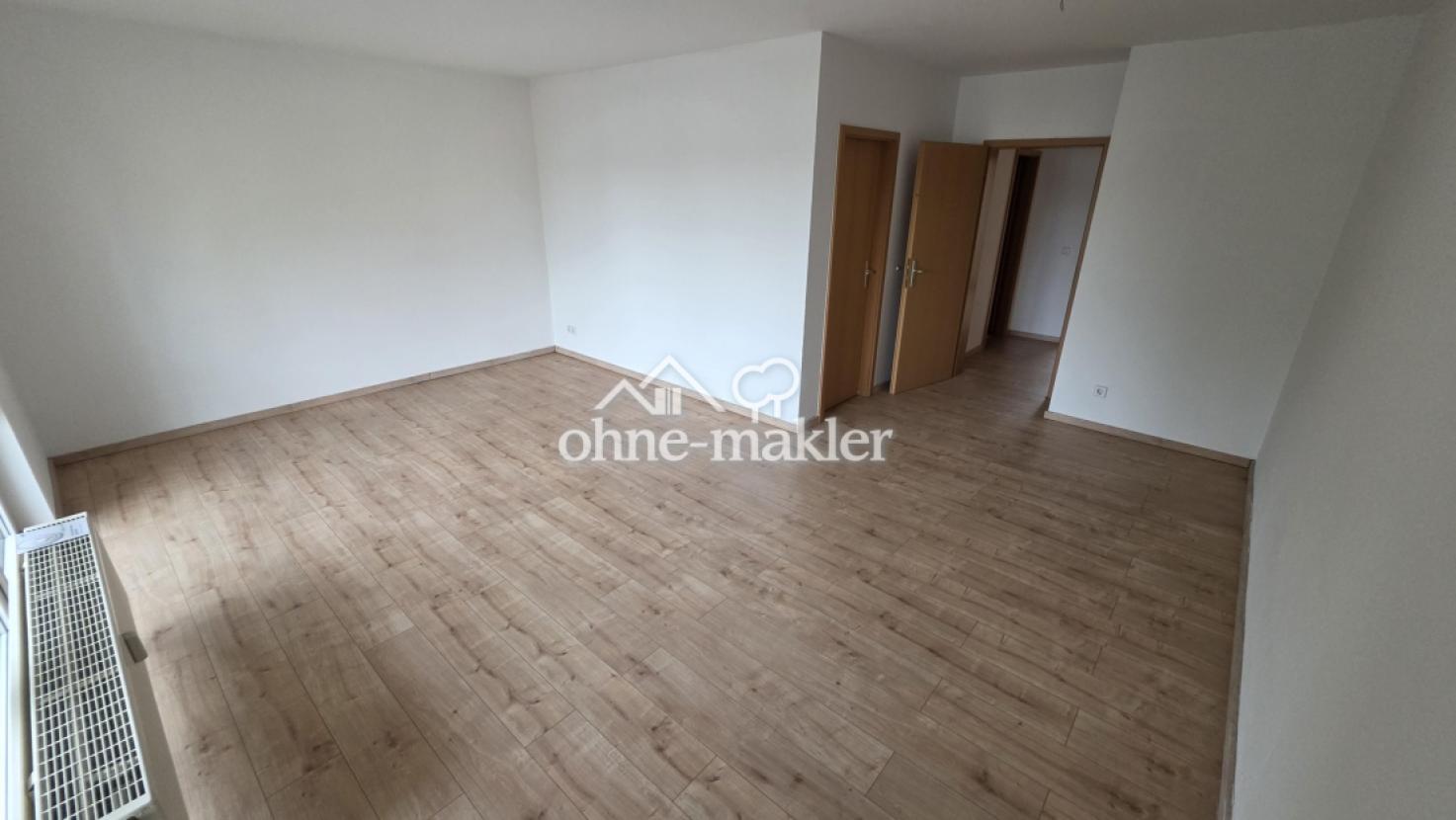 Wohnzimmer Blick auf Küche/Bad