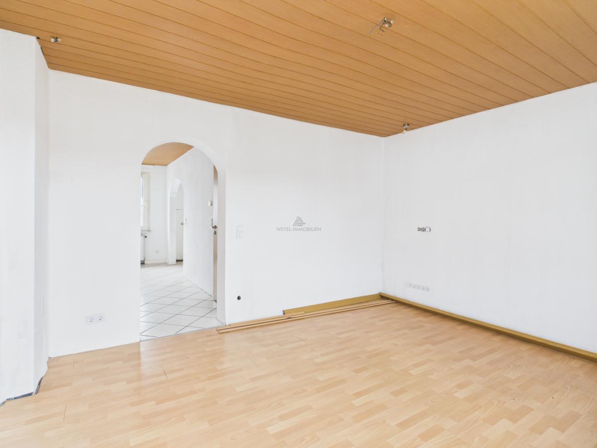 Wohnzimmer- Weyel Immobilien