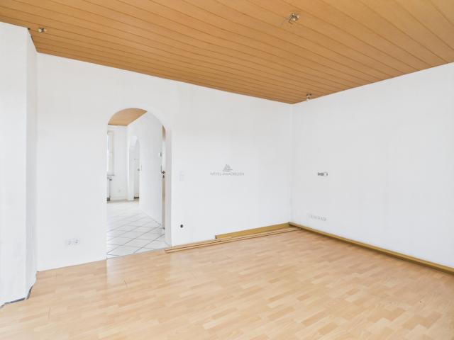 Wohnzimmer- Weyel Immobilien