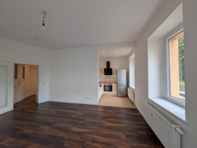 Wohnzimmer mit Küche
