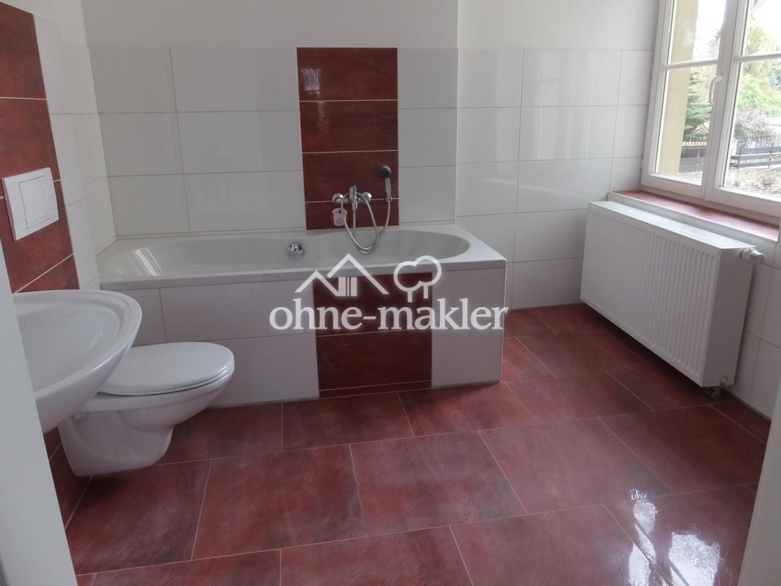 Bad mit Dusche und WC