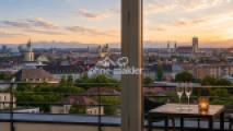 Münchner Skyline trifft Alpen