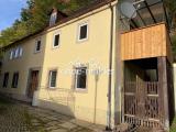 Ansicht Haus mit überd. Balkon