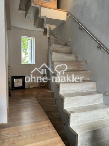 OG mit freitragender Treppe