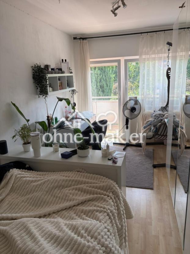 Schlafzimmer mit Balkon