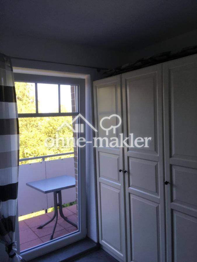 Schlafzimmer mit Balkon