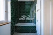Badewanne und Regendusche