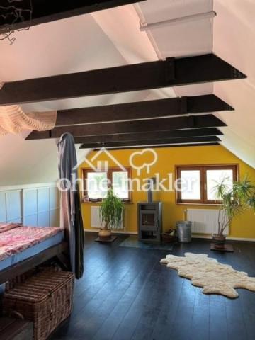 Schlafzimmer mit Kaminofen