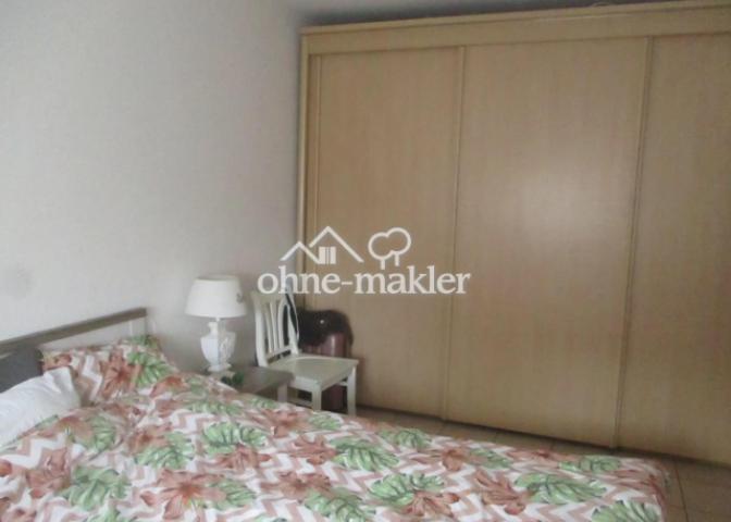 Schlafzimmer mit Einbauschrank