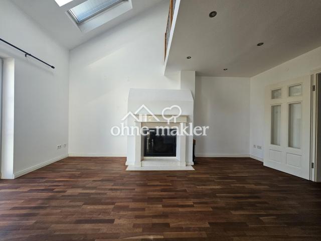 Wohnzimmer mit Kamin