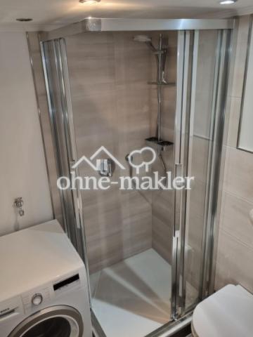 Dusche mit Waschmaschine