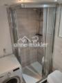 Dusche mit Waschmaschine