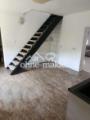 Küche mit Treppe nach oben