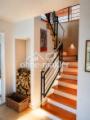 Treppe und Holzlager EG