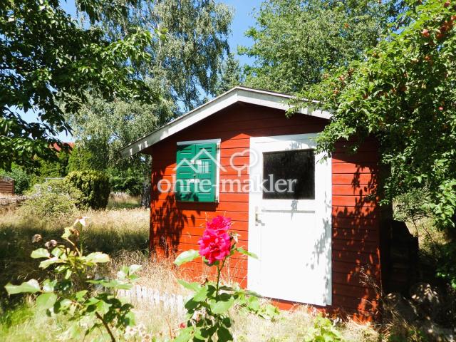 Rotes Gartenhaus