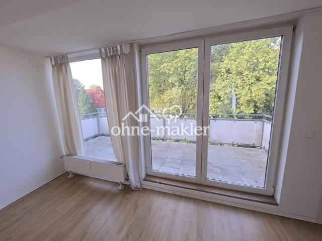 Wohnzimmer mit Balkonausgang