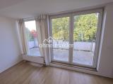 Wohnzimmer mit Balkonausgang