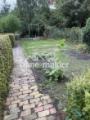 Pflanzgarten und Schaukel
