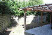 überdachte Terrasse und Garten