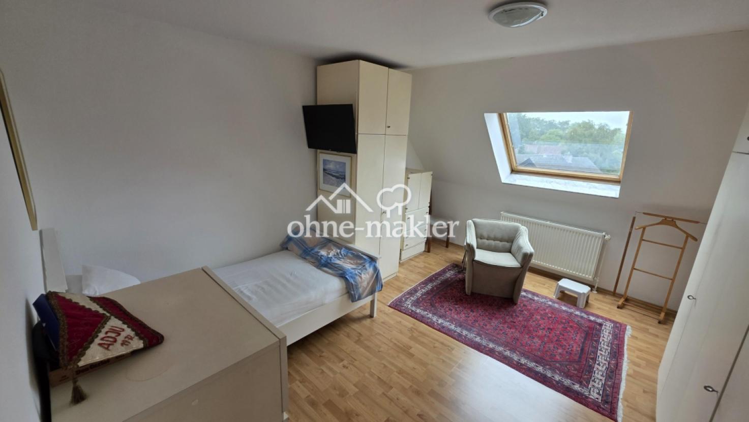 Schlafzimmer mit Dachfenster