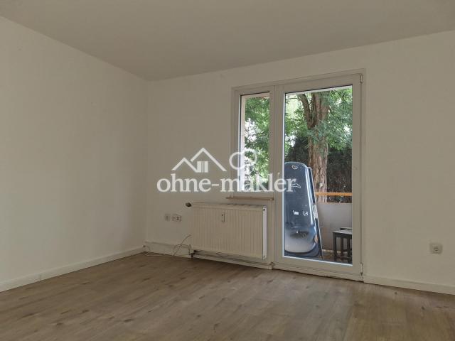 Wohnzimmer mit Balkon