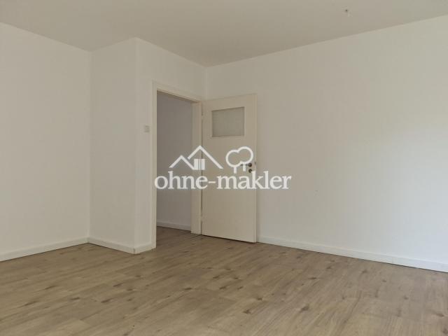 Wohnzimmer mit Balkon