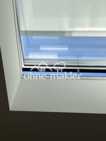 Dachfenster mit Sonnenschutz