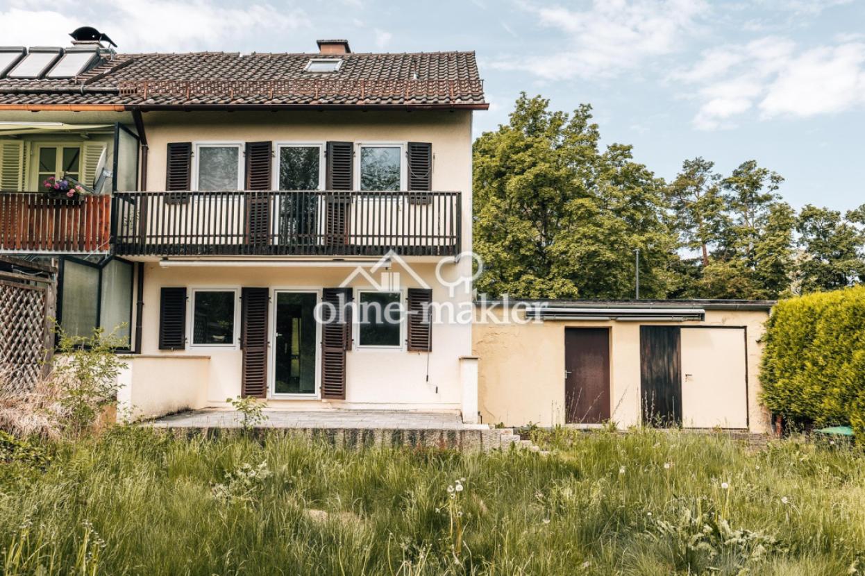 Haus Gartenansicht mit Garage2
