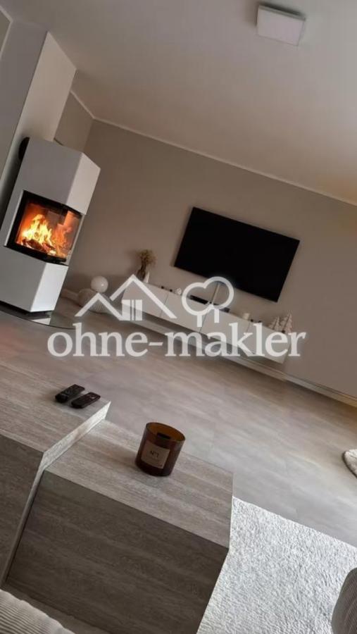 Wohnzimmer mit Kamin