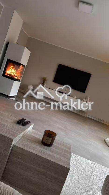 Wohnzimmer mit Kamin