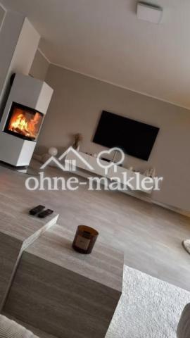 Wohnzimmer mit Kamin