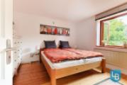 Individuell nutzbares Zimmer mit Kachelofen
