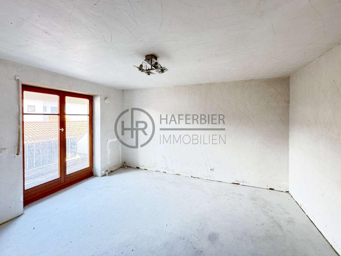 Schlafzimmer mit Balkon 1. OG