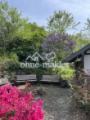 Grillecke mit Gartenhaus