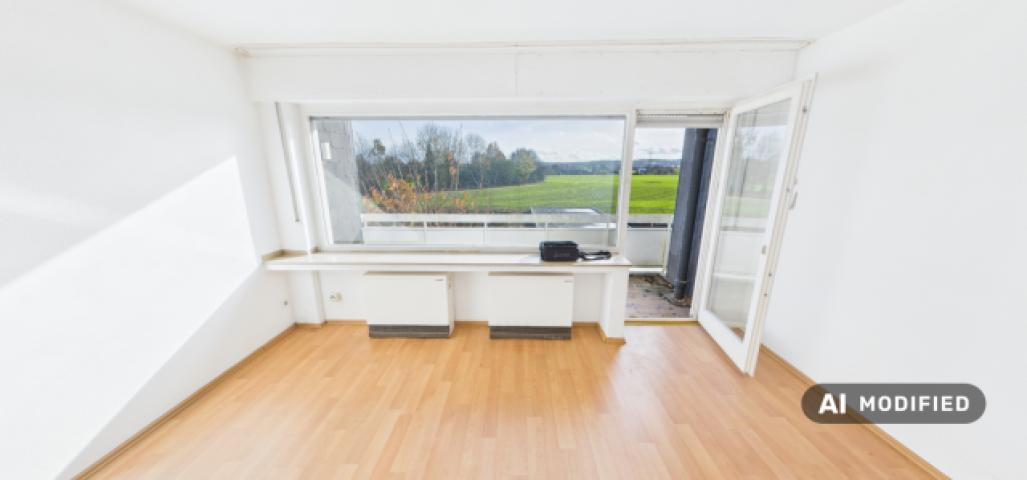 Wohnzimmer mit Balkonzugang