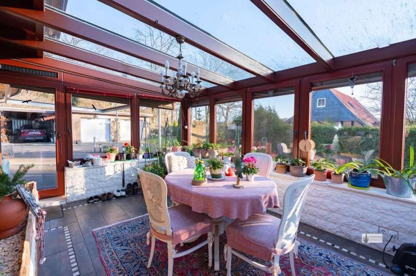Wintergarten mit Schiebetüren