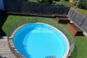 Garten mit Pool und Hochbeeten