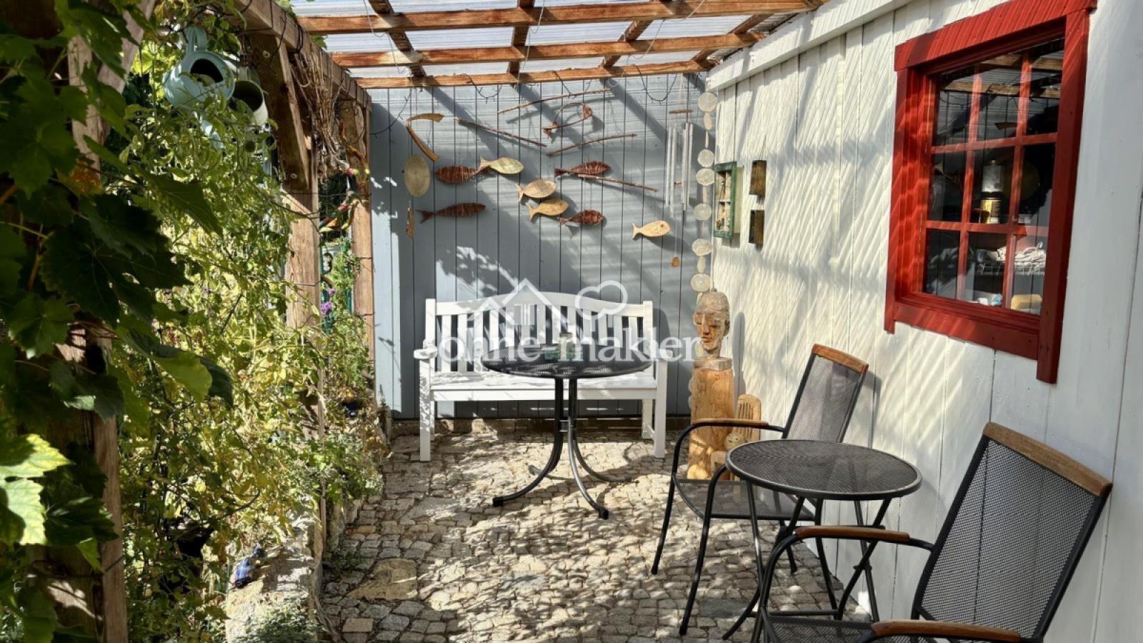 Pergola hinter Carport