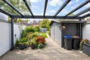 12 überdachte Terrasse