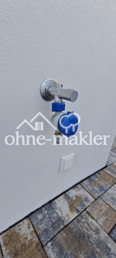 Gartenwasserhahn mit Wasseruhr