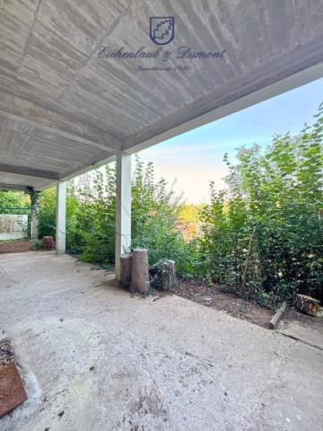Gartengeschoss mit überdachter Terrasse