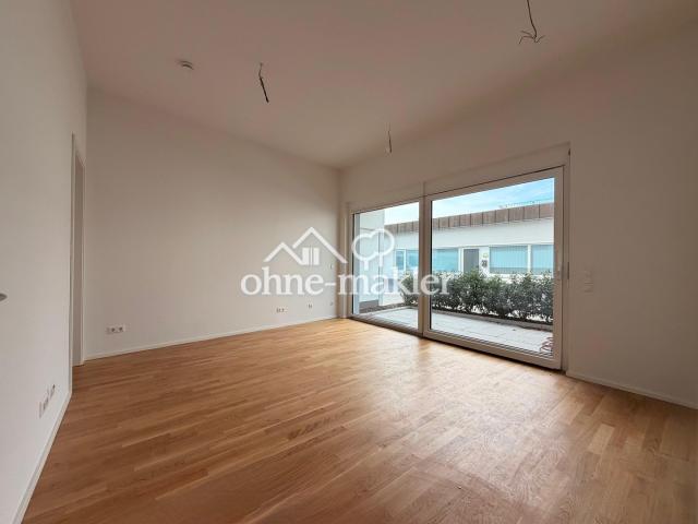 Wohnzimmer mit offener Küche