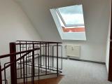 Galerie mit großem Dachflächenfenster