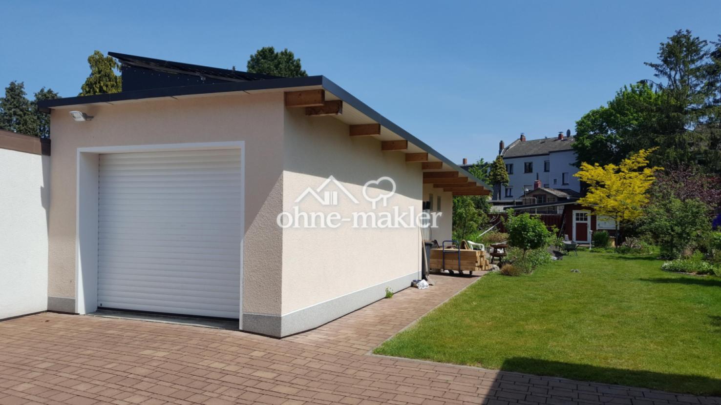 Garage +angrenzendem Holzlager