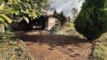 Gartenhaus mit Grillplatz