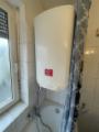 Bad mit WC und Warmwasserboiler
